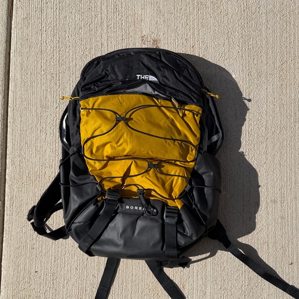 The North Face Men's Backpack in Black and Yellow